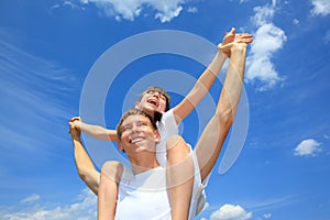 Sister on brothers shoulders photo