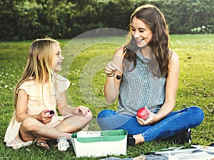 Sister Girls Talk Picnic Togetherness Outdoors Concept