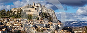 Sisteron Citadel with rooftops and fortifications. Southern Alps France photo