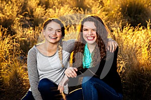 Sisters In A Backlit Field