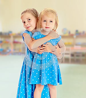 Sisters in blue dresses