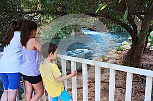 Sisters and Brother watching the Jordan River