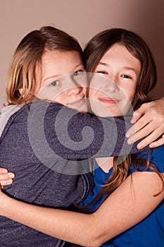 Sisters hugging