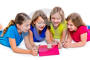 Sisters kid girls with tech tablet pc playing happy