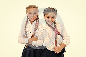 Sisters little girls with braids ready for school. School fashion concept. Be bright. School friendship. Sisterhood