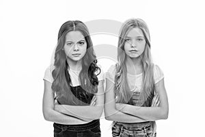 Sisters little kids isolated white background. Sisterly relationship. Sisterhood happiness and issues. Girls confident