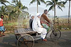 Sisters of Missionaries of Charity of Mother Teresa by rickshaw visit patients in the Sundarbans, West Bengal,