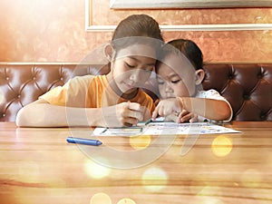 Sisters painting in living room