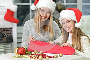 Sisters preparing for Christmas