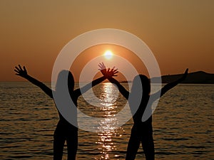 Sisters in sunset photo