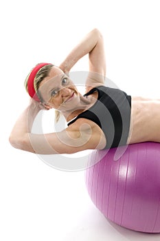 Sit ups middle age woman fitness core ball