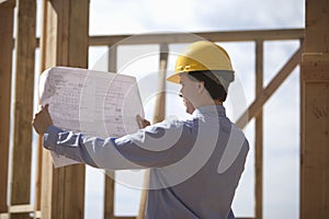 Site Manager Analyzing Building Plans