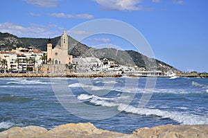 Sitges church and sea in Sitges, Catalonia, Spain photo