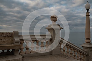 Sitges, Spain: the church of Sant Bartomeu and Santa Tecla`s balcony with classic balustrade photo