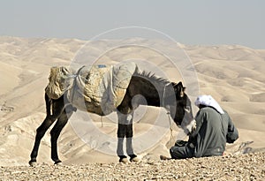 Sitting bedouin photo