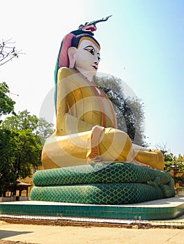 Sitting Buddha in Kyaw Aung San Dar Monastery, Amarapura, Mandalay, Myanmar