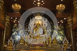 Sitting Buddha statue in the Chinnarat posture, which is the main Buddha in the chapel at Wat Tha Mai temple.