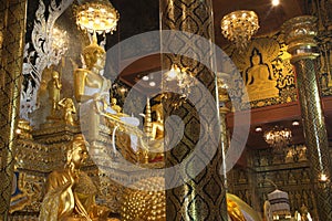 Sitting Buddha statue in the Chinnarat posture, which is the main Buddha in the chapel at Wat Tha Mai temple.