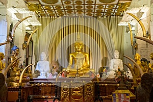 Sitting Buddha statue in Temple of the Tooth. Kandy, Sri Lanka