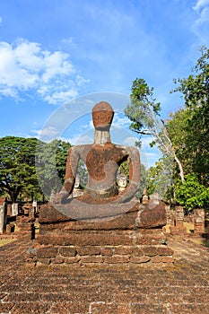 Sitting Buddha statue at Wat Phra Kaeo temple in Kamphaeng Phet Historical Park, UNESCO World Heritage site