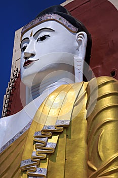 Sitting Buddha statues at the Kyaik Pun Pagoda in Bago