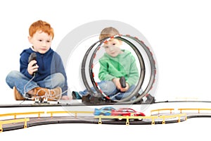 Sitting children playing kids racing toy car game
