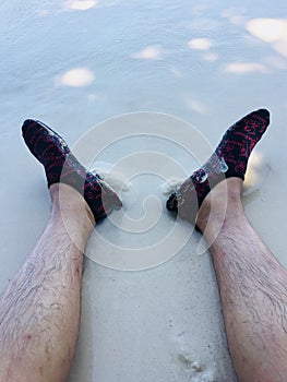 Sitting and chill out on the white sand  beach at similan island