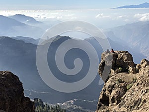 Sitting on the edge of the rocks, Cran Canaria, Spain