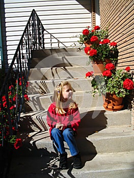 Sitting with the geraniums