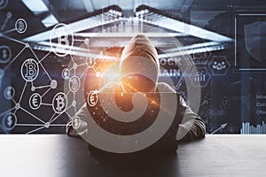 No face hacker with laptop and digital blockchain interface