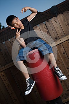 Sitting on a punching bag