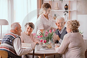 Sitting by the table photo