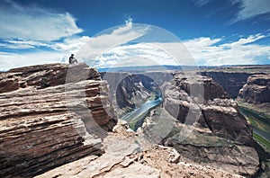 Sitting on the top of the Horseshoe Bend on Colorado River