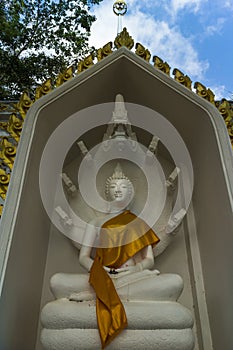 The sitting white buddha statue