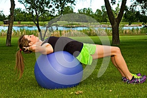 Situps on exercise ball