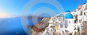 Sityscape of Oia village in Santorini island in summer morning, panoramic view