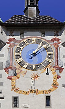 Siwss old town Baden: Gate with sundial photo