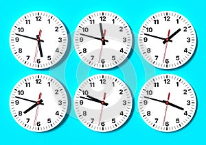 Six analog clocks on wall, showing world time