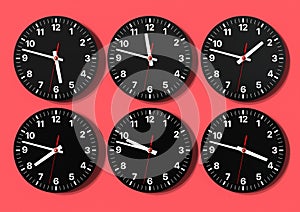 Six analog clocks on wall, showing world time