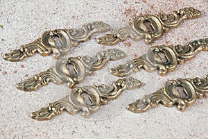 Six antique brass keyholes lock covers