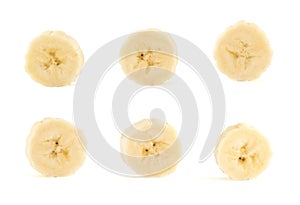 Six banana slices set over white background