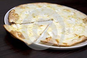 Six cheese pizza.