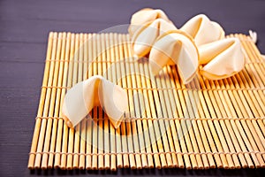 Six Chinese fortune cookies with prediction on the table