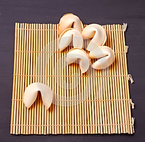 Six Chinese fortune cookies with prediction on the table