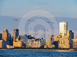 Six helicopter flying around the Manhattan city