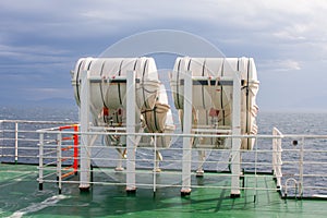 Life-saver barrels on ferry photo