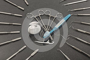 Six march, dentists day. Dentistry background with dentistry instruments