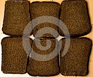 Six pieces of black bread