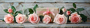 Six Pink Roses and Giftbox on Rustic White Wooden Background - Romantic Floral Gift Idea for Any Occasion