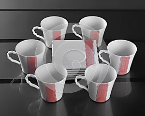 Six porcelain cups of coffee